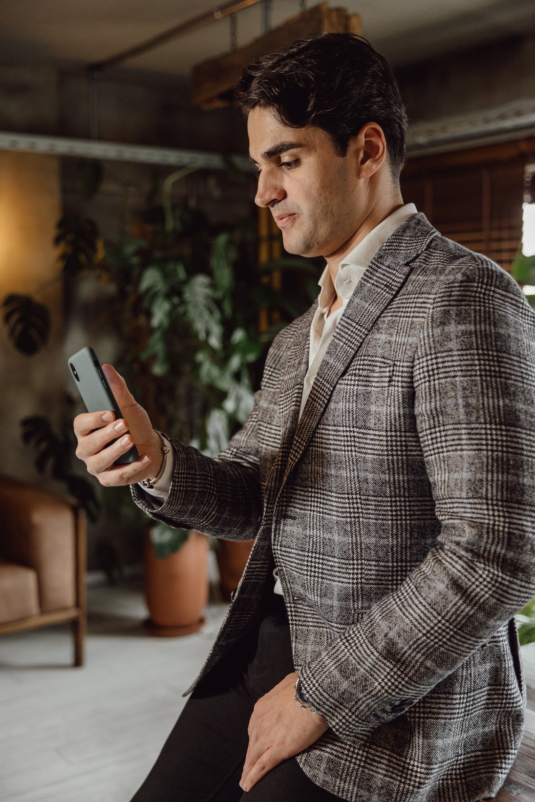 Man Using His Phone in the Office